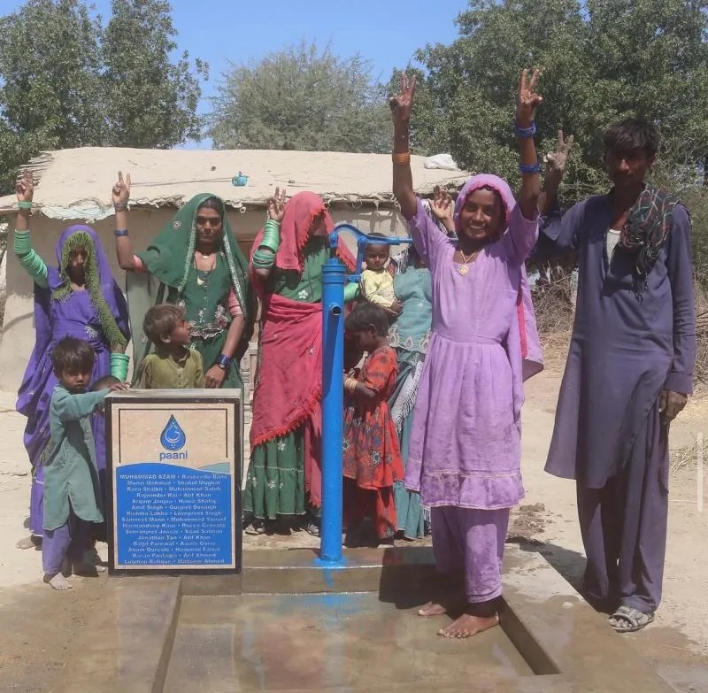 A Paani clean water well funded by Sixco customers, with their names engraved